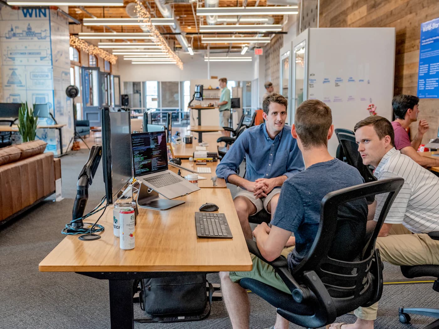 Professional team reviewing a project together in a modern office